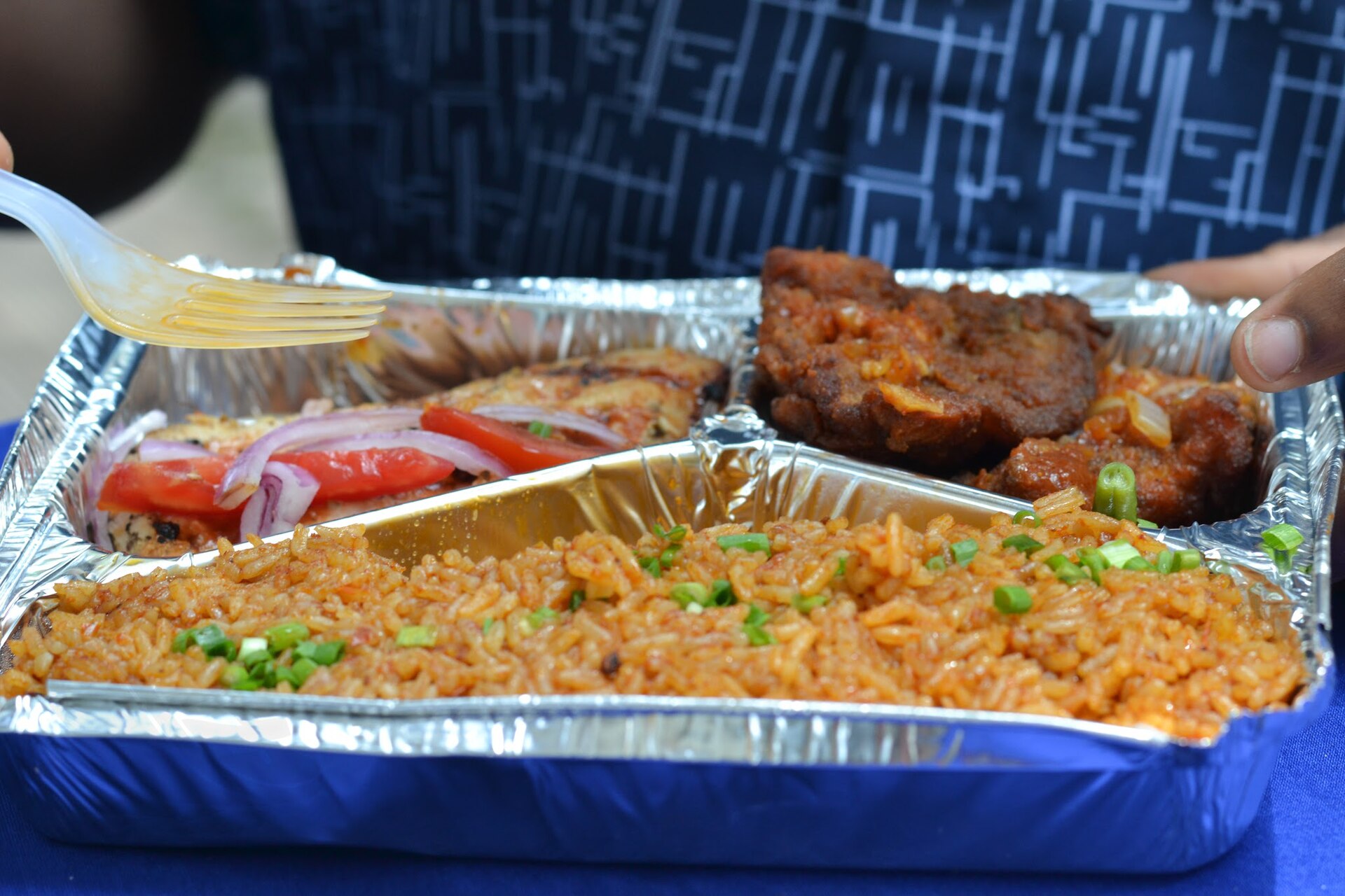 Jollof rice packed for takeaway